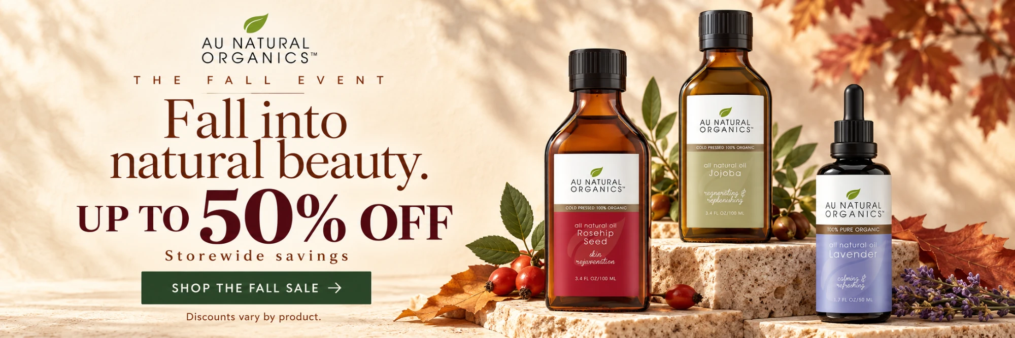 Au Natural Organics Fall Event: up to 50% off storewide, with Rosehip Seed, Jojoba and Lavender oil bottles among autumn leaves