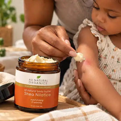 Shea Butter Nilotica jar with shea nuts