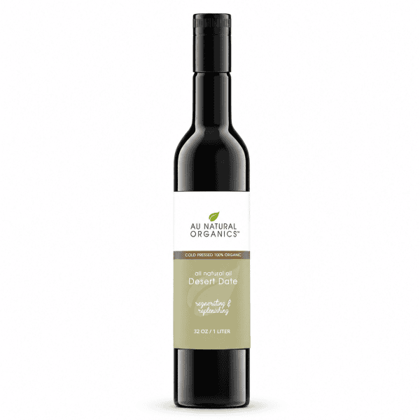Au Natural Organics Desert Date Oil 1 liter bottle on white