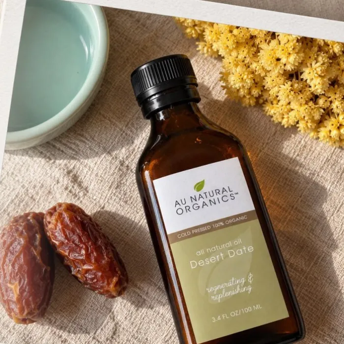 Desert Date Oil bottle with dates and dried flowers
