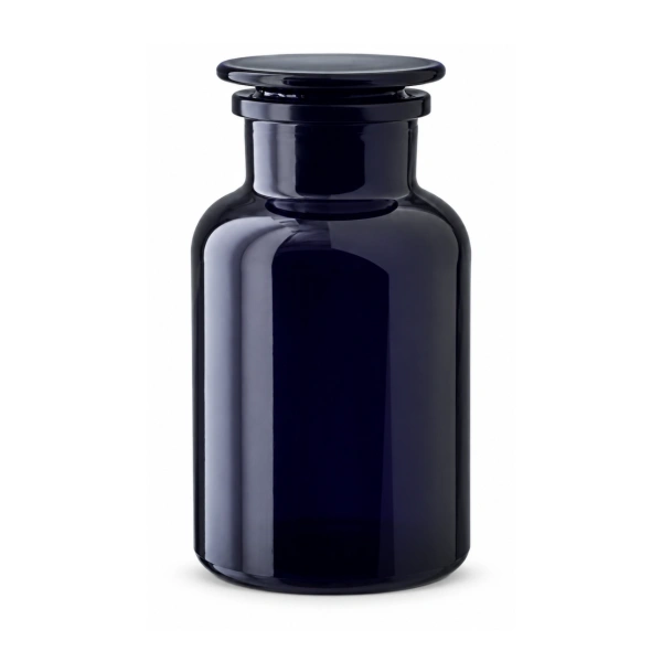 Miron violet glass apothecary jar with flat glass stopper on white