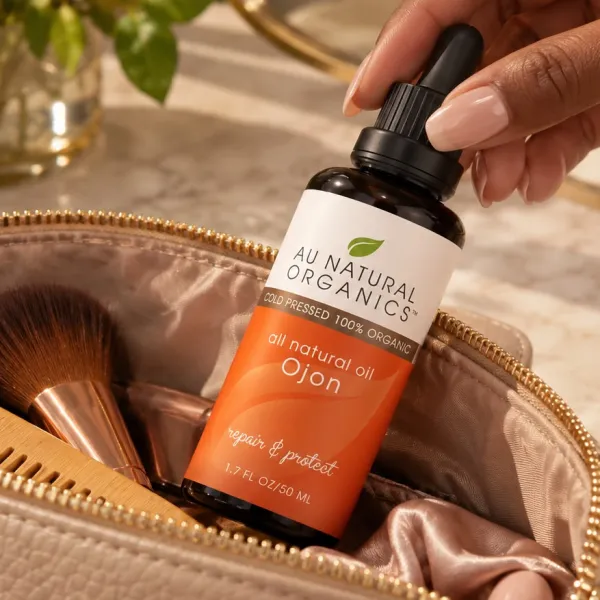 Raw Ojon Oil dropper bottle in a makeup bag