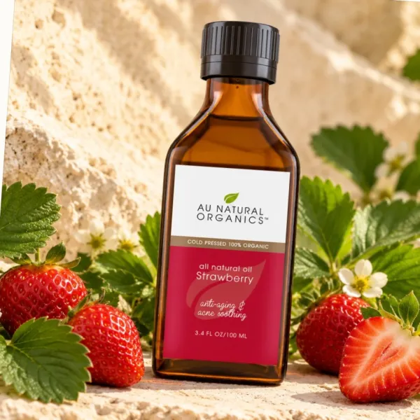 Strawberry Seed Oil bottle with fresh strawberries